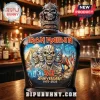 Iron Maiden 50th Anniversary bottle with Eddie skull graphics and Egyptian imagery on a dark glass surface!