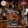 Black liquor bottle with 3D Iron Maiden Eddie graphic, 51st Anniversary text, and flames on a wooden bar counter!