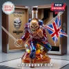 Anniversary rum bottle shaped like Iron Maiden Eddie character holding sword and flag in front of wooden display box!