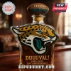 Glass liquor bottle with Jaguars logo, football stopper, and Duuuval 30th Anniversary text in gold.!