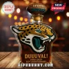 Glass liquor bottle featuring a Jacksonville Jaguars jaguar head logo with football stopper and 30th anniversary text!