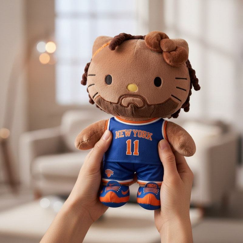 Jalen Brunson Hello Kitty plush doll in Knicks jersey on a wooden shelf