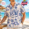 Mens blue and cream tropical print shirt with vintage toile design of a guitar player parrots and palm trees text EST 1946!