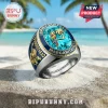 Silver Jimmy Buffett Margaritaville ring with blue stone, parrot, palm tree, and guitar graphics on beach background!