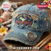 Distressed blue denim baseball cap with embroidered parrot, margarita, lighthouse, and Jimmy Buffett text details!