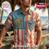 Men denim shirt with US flag print, parrot, compass, and Margaritaville text on a beach backdrop!