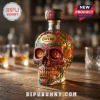 Jose Cuervo tequila bottle shaped like a skull with colorful floral carvings and decorative patterns on a wood table!