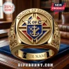 Gold ornate Knights of Columbus K of C ring with blue and red details, featuring swords, anchor, fasces, ships, and 'YOUR NAME' text!