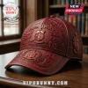 Dark red Kappa Alpha Psi baseball cap with 3D embossed crests text and symbols on a library background!