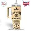 Distressed beige Stanley tumbler, rustic design. Features 