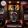 Black Crown Royal bottle with KISS band graphics, red flames, and 50th Anniversary text in a glass display case!