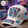 White distressed KISS baseball cap with multi-color gradient logos! Cartoon KISS band members relax in floats, Gene Simmons surfs!