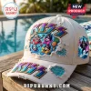 White distressed baseball cap with vibrant chibi KISS band members on pool floats! Gradient 'KISS' text on front and brim! Gene Simmons demon surfing patch!
