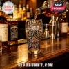 Glass cup featuring Kraken Terror of the Deep octopus graphic and compass design on a wooden bar counter!