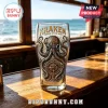 Clear pint glass with a bronze octopus illustration, Kraken Terror of the Deep text, and a compass design detail!