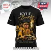 Black t-shirt featuring Kyle Busch, racing car, trophy, gold flames, and text Kyle Busch 1985-2026 A Champion Forever!