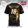 Black t-shirt featuring Kyle Busch, number 18, gold wings, gates, and text Legends Never Die with winning quote!