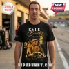 Black graphic t-shirt featuring Kyle Busch, gold race car, trophy, text A Champion Forever, 1985-2026, and fire effects!