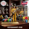 Kyle Busch collectible figure with golden wings holding trophy next to M and Ms Toyota race car model!