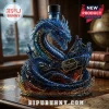 Decorative blue glass rum bottle shaped like a sea serpent attacking a ship with The Leviathan Black Spiced Rum label!