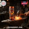 Lord of the Rings 20th anniversary glass featuring axe emblem and Forged In Stone text on a blacksmith anvil background!