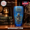 Blue glass tumbler with gold The Lord of the Rings 20th Anniversary logo, helmet, sword, and heraldic crest design!