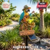 Solar garden stake featuring a macaw with a straw hat and ukulele, text reads PARROT HEAD PARADISE WASTIN AWAY AGAIN!