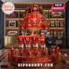 Ornate red gold Manchester United fan display with player figures, 