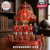 Red and gold ornate Manchester United football legends statue with 
