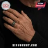 Ornate metallic ring with a wide green band, red rectangular accents, gold details, and stylized skull patterns! Gothic style!