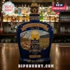 Blue University of Michigan Centennial decanter featuring Wolverine topper, stadium art, and 100th anniversary text.!