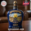 Blue glass whiskey bottle commemorating Michigan Stadium 100th anniversary with Wolverine topper and gold stadium graphics!