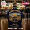 Blue University of Michigan Centennial bottle with gold logo, stadium imagery, and Big House text.!