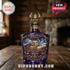 Purple glass decanter with Minnesota Vikings 65th Anniversary graphic, gold viking helmet stopper, and stadium scene art!