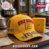 Yellow baseball cap with embroidered text In Memory Of Kyle Busch 18 and M&M logo with NASCAR patch on side!