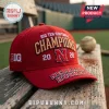 Red baseball cap with 'BIG TEN SOFTBALL CHAMPIONS 20 N 26' and 'NEBRASKA HUSKERS' embroidery! Gold, red, white text!