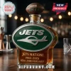 Glass liquor bottle with Jets logo, football topper, and text reading Jets Nation 1960-2025 65th Anniversary!
