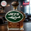 Glass liquor decanter with New York Jets green logo and football stopper labeled 1960-2025 65th anniversary!