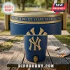 A detailed split image of a blue Yankees cooler highlighting the gold 125 years inscription band, the large gold logo, and the spigot on a table with peanuts!