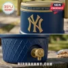 A split image displaying a close up of the gold New York Yankees logo on a blue textured cooler and a detail of the functional gold spigot below it!