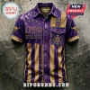 Purple and gold Omega Psi Phi button down shirt with Manhood Scholarship Perseverance Uplift text and fraternity symbols!