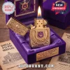 Gold ornate lighter in purple velvet box with Greek letters 