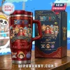 Red metal tumbler featuring One Piece anime characters, 29th Anniversary text, and straw, standing next to a matching box!