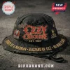 Black distressed bucket hat, red gold OZZY OSBOURNE EST 1980 text, bat, skull. Gold text: DIARY OF A MADMAN BLIZZARD OF OZZ NO MORE TEARS!