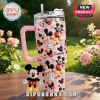 Pink glitter stainless steel tumbler with Mickey Mouse pattern and name Charlie attached with a plush Mickey keychain!