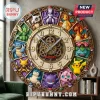 Ornate gold Pokémon wall clock, featuring vibrant Pikachu, Charizard, Blastoise, and more, with 