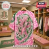 Pink and green tie-dye t-shirt featuring a butterfly and AKA ribbon design with pearls and ivy accents!