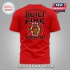 Red t-shirt with Scooby Doo fire department logo text Built By Fire and vintage badge graphic on back!
