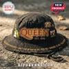 Black distressed Queen bucket hat with gold 'QUEEN EST. 1970' text, Freddie Mercury emblem, Union Jack pin! Song lyrics on brim!
