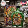Green glass bottle and box with Rat Fink graphic, flames, motorcycle, and Rat Fink 63rd Anniversary 1963-2026 text!